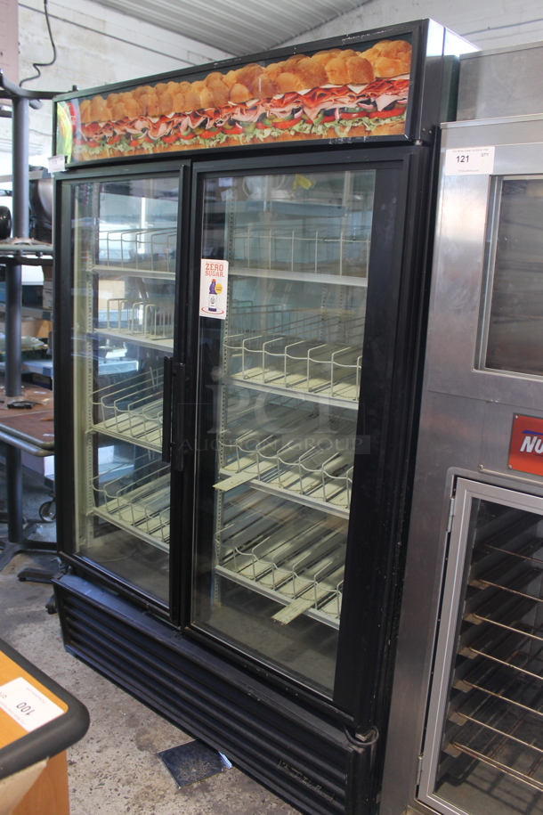 True GEM-49 Metal Commercial 2 Door Reach In Cooler Merchandiser w/ Poly Coated Racks and Drink Sliders. 115 Volts, 1 Phase. Tested and Powers On But Does Not Get Cold - Image 1 of 4