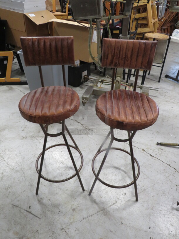 Vintage Metal Bar Stool With Well Worn Leather Look Cushioned Seat And Back And Footrest. 2XBID - Image 1 of 3