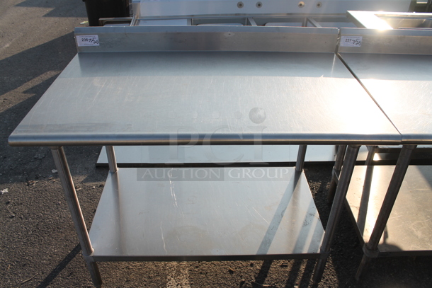 Stainless Steel Commercial Table w/ Back Splash and Under Shelf.  - Image 1 of 3