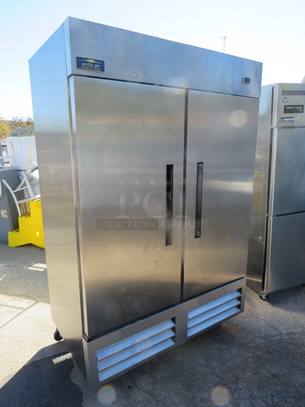 One Artic Air 2 Door Freezer With 4 Racks On Casters. Model# AF49X.  53.5X33X83. $3545.00. - Image 2 of 4