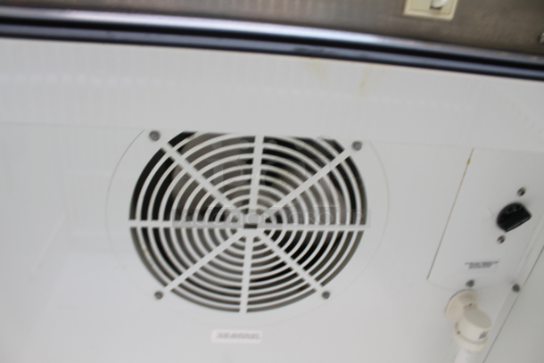 True T-19 Stainless Steel Commercial Single Door Reach In Cooler w/ Poly Coated Racks on Commercial Casters. 115 Volts, 1 Phase. Tested and Powers On But Does Not Get Cold - Image 7 of 8