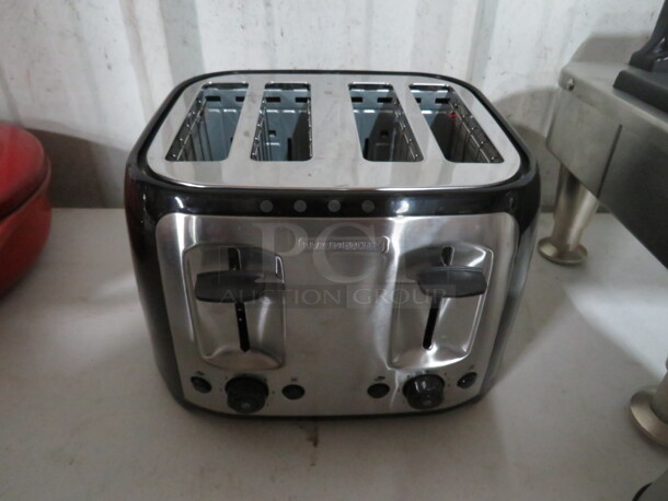 One Black And Decker 4 Slice Toaster.