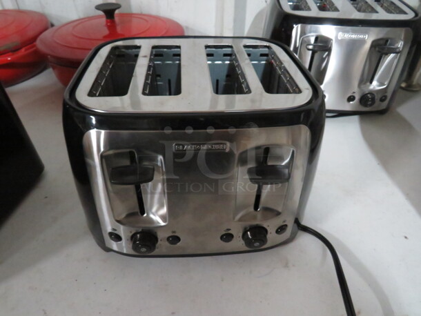 One Black And Decker 4 Slice Toaster.