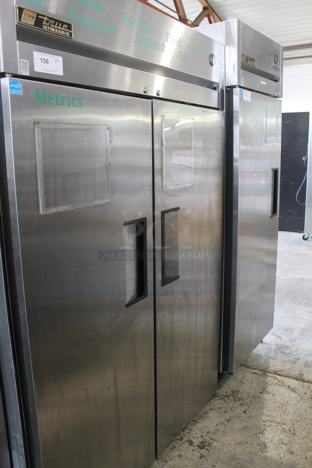 2013 True TG2R-2S ENERGY STAR Stainless Steel Commercial 2 Door Reach In Cooler w/ Poly Coated Racks on Commercial Casters. Tested and Working!