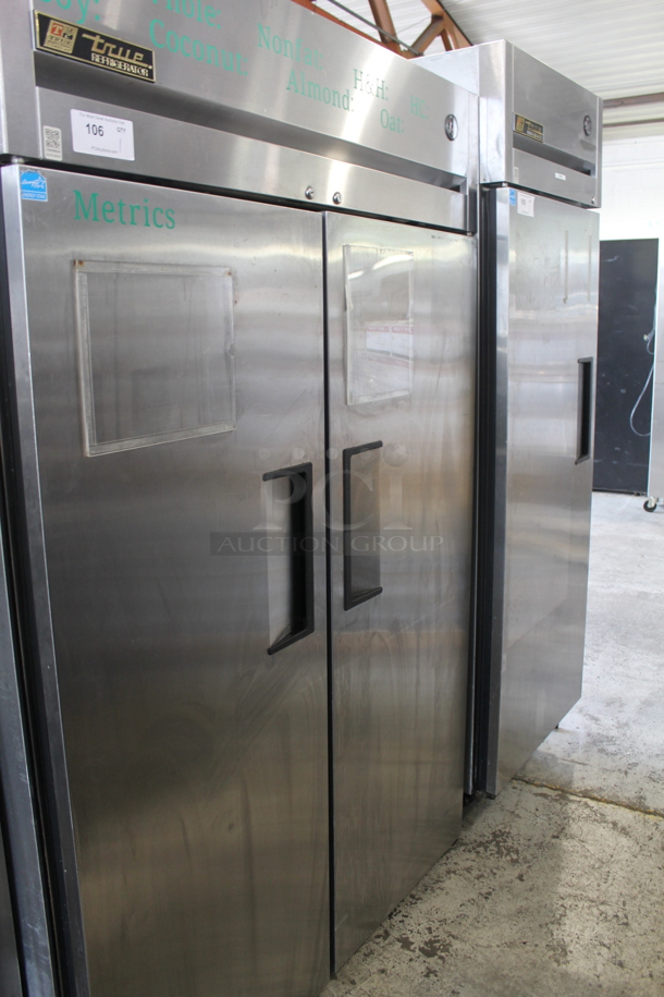 2013 True TG2R-2S ENERGY STAR Stainless Steel Commercial 2 Door Reach In Cooler w/ Poly Coated Racks on Commercial Casters. Tested and Working! - Image 1 of 7