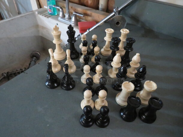 One Lot Of Chess Pieces