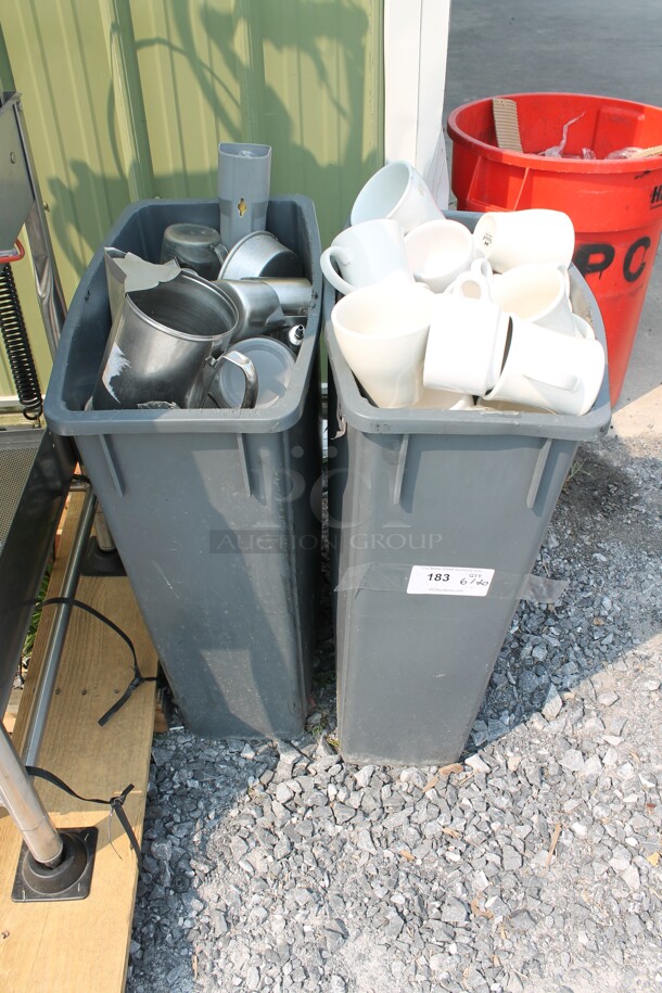 ALL ONE MONEY! 2 Slim Jim Trash Cans Including White Coffee Mugs And Frothing Pitchers, Cake Pans, AND MORE!  - Image 1 of 4