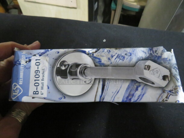 One NEW T & S Wall Bracket.  - Image 1 of 1