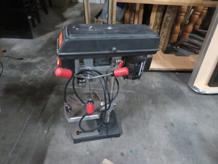 One Craftsman 9 Inch Drill Press. 