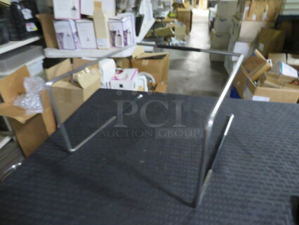 One NEW Vollrath Pizza Pan Holder.