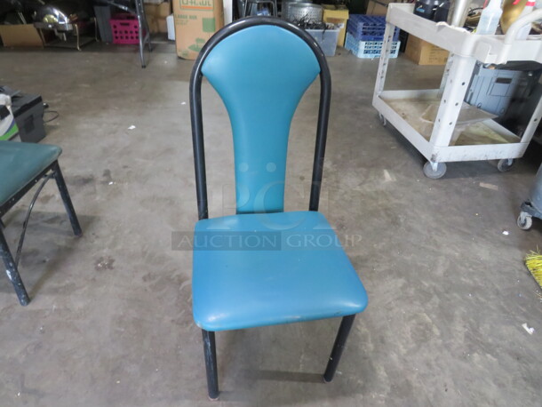 One Black Metal Chair With A Teal Cushioned Seat, And Back.  - Image 1 of 1