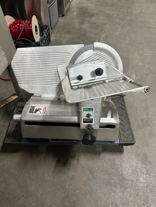 One WORKING General Deli Slicer. Model# SM12A. 120 Volt. - Image 1 of 2