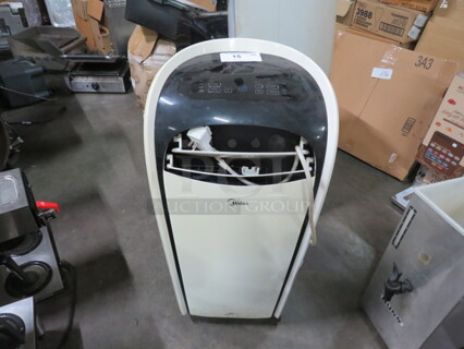 One Midea Portable A/C. Model# MPG-10CRN1-BH9. 115 Volt. 