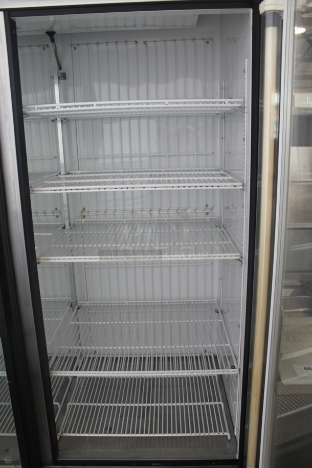 2011 True GDM-49F ENERGY STAR Metal Commercial 2 Door Reach In Freezer Merchandiser w/ Poly Coated Racks on Commercial Casters. 115/208-230 Volts, 1 Phase.  - Image 5 of 8