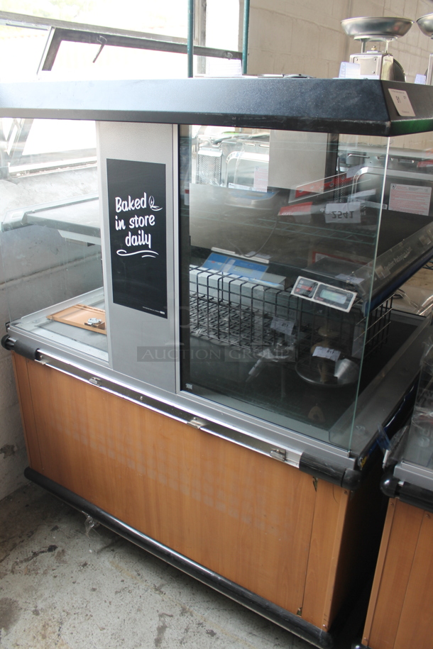 Metal Commercial Floor Style Electric Powered Heated 2 Tier Merchandiser on Commercial Casters. - Image 1 of 7