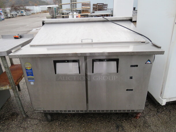 One Everest  2 Door Refrigerated Prep Table With 2 Racks,  On Casters. 115 Volt.  48X36X44 - Image 1 of 3