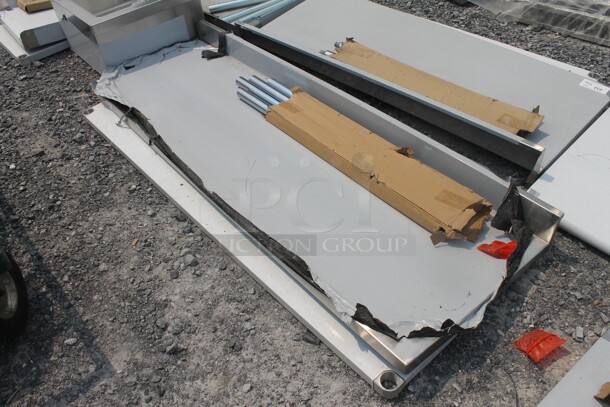 BRAND NEW SCRATCH AND DENT! Regency 600TB2472G Commercial Stainless Steel Disassembled Work Table With Undershelf And Galvanized Legs - Image 3 of 4