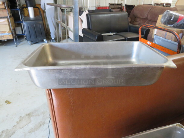 One Full Size 4  Inch Deep Hotel Pan. 