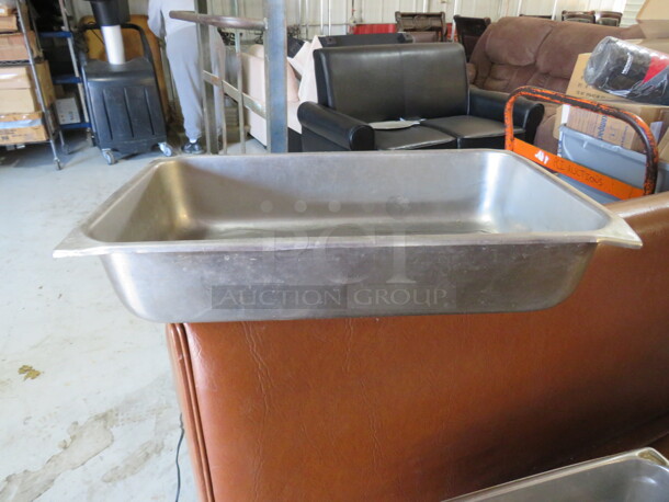 One Full Size 4  Inch Deep Hotel Pan.  - Image 1 of 1