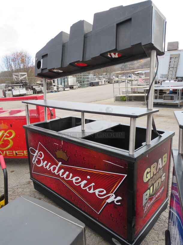 One Budweiser IRP Elite Beverage Cart/Kiosk With 2 Wells, Under Shelf, And Over Shelf On Casters.  62X30.5X78  - Image 1 of 3