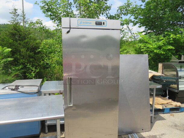 One Edesa 1 Door Refrigerator With 2 Racks. 115-120 Volt. Model# EDR1-D. 27.5X31.5X76