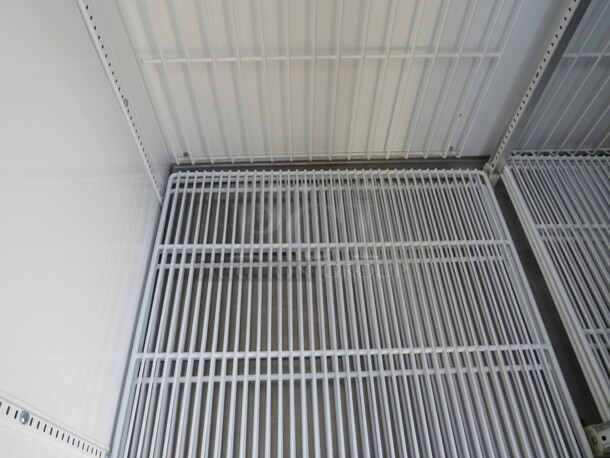 One Stainless Steel 3 Door TRUE Freezer With Racks On Casters. Model# 72F. 115 Volt.  - Image 4 of 6