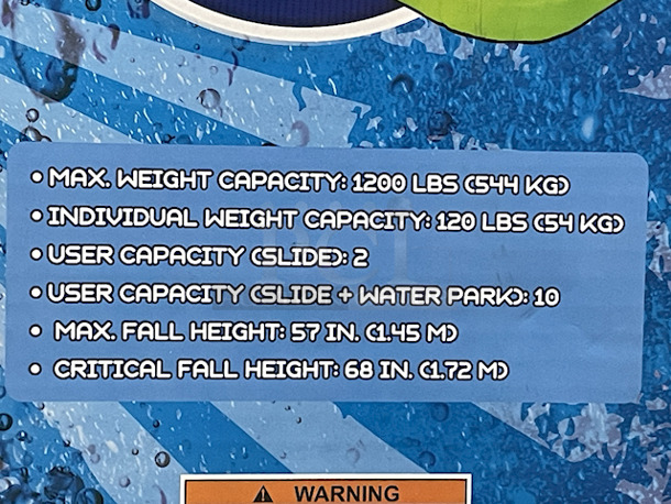 H2O GO Inflatable Water Park With Water Slide – Over 23ft Long. Contains: 01 SLIDE; 01 BLOWER (STAKES INCLUDED); 01 REPAIR KIT (MULTIPLE ASSORTED PATCHES); 1 STORAGE BAG; 10 BOUNCER STAKES; 1 PUC BALL SPRINKLER; 06 SMALL FLAGS; 01 WATER SPRAYING HOSE. Overall: 23ft – 4in x 10ft – 2in x 8ft – 8in.  - Image 3 of 9