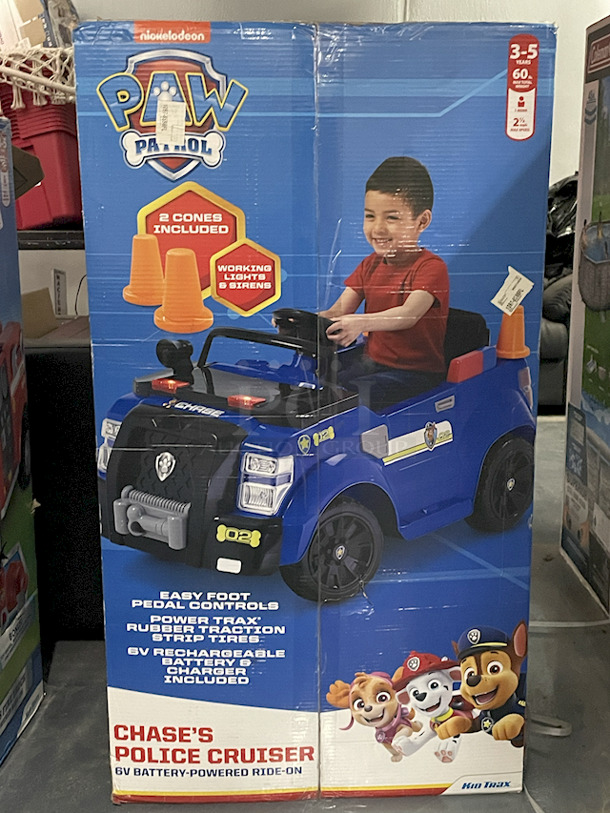 NEW IN ORIGINAL PACKAGING!! Kid Trax Nickelodeon Paw Patrol Chase's Police Cruiser 6v Battery-Powered Ride-On. Includes: 6v Battery & Charger, 2 Cones & Working Lights & Siren. 