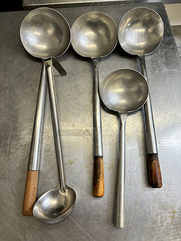 (4) Large Spoons and (1) 3oz Ladle. 5x Your Bid - Image 1 of 1