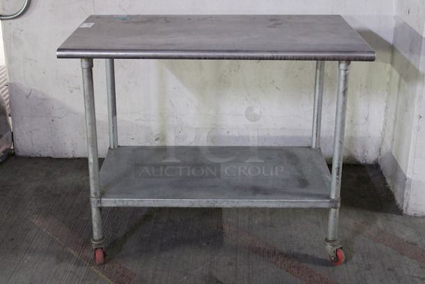 48x30 Inch Equipment Stand With Undershelf On Commercial Casters, Stainless Steel. 48x30x38