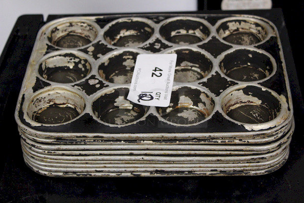 AWESOME! 12 Hole Muffin Pans. Muffin Hole Measurements 2-1/2”x1”. OA 13x10x1 10x Your Bid - Image 1 of 1