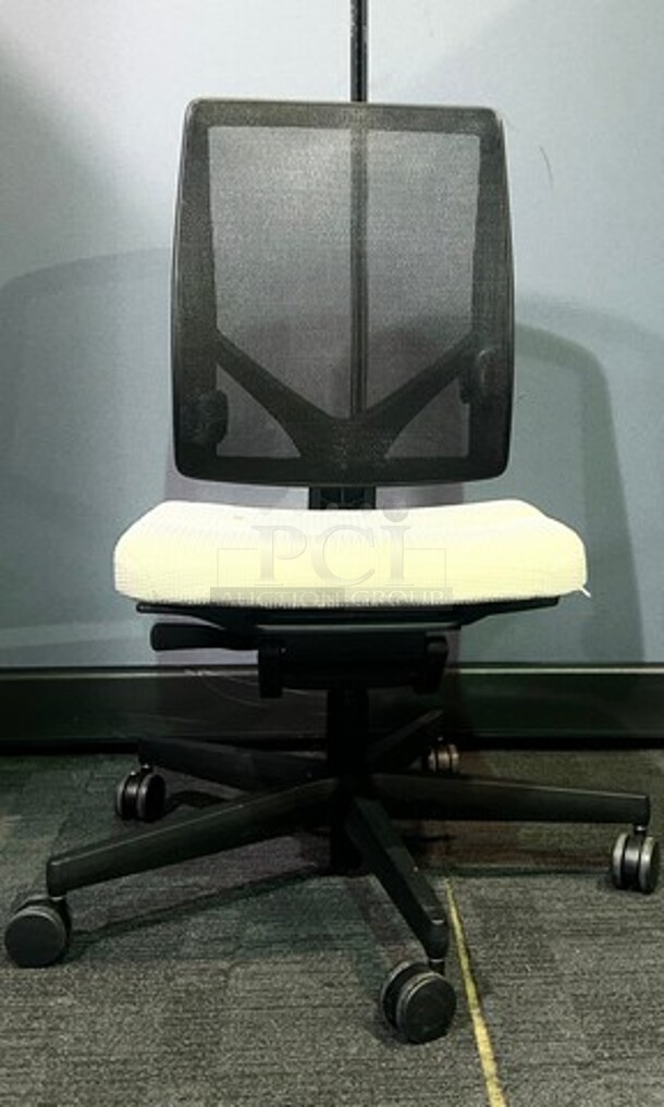 Adjustable AllSteel brand office chairs. No tears or rips, in good used condition! Off-white upholstered seat with a black mesh back and a black metal frame on wheels. Perfect for training rooms, large offices or anywhere that a larger number of matching seating would be preferred. Measure 38.5” H x 19” W. BIDX10 - Image 1 of 3
