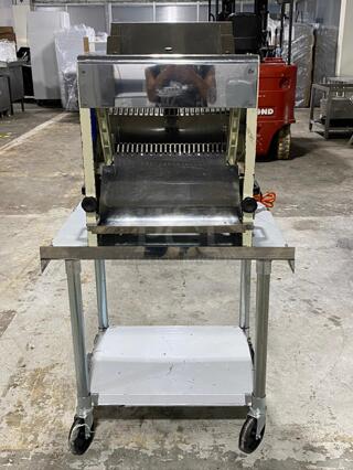 Omcan 302-5/8 Countertop Electric Bread Slicer. Stand not included
