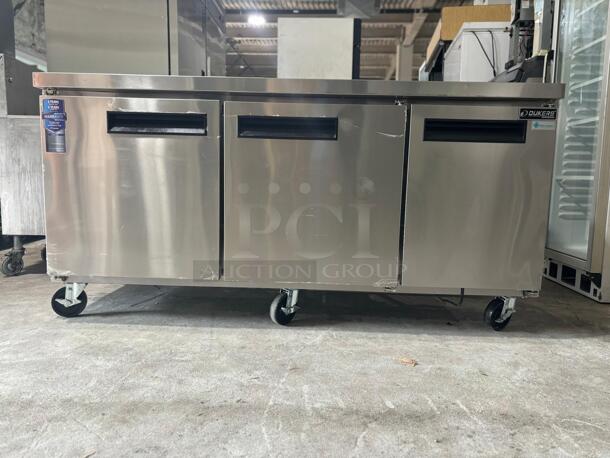 Brand New Scratch & Dent Dukers DUC72R 3-Door Undercounter Commercial Freezer in Stainless Steel
 - Image 1 of 7