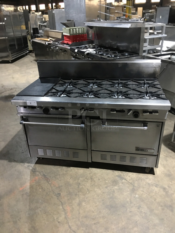 AN ANMAZING FIND! Garland 8 Burner Stove! With Left Side Hot Plate! With Back Splash! With 2 Full Size Ovens Underneath! With Metal Oven Racks! All Stainless Steel! On Casters! - Image 1 of 10