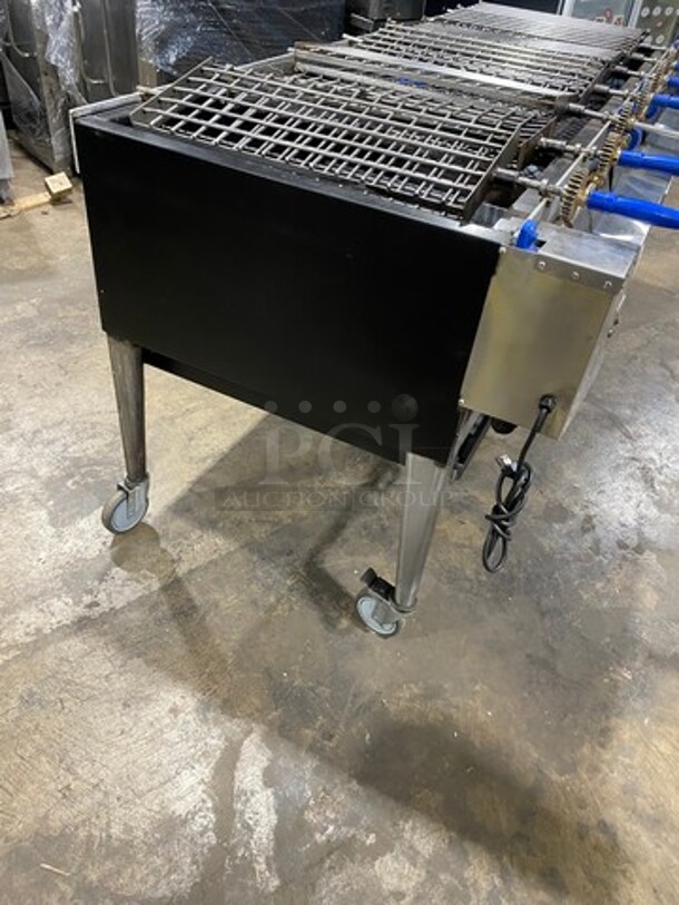 AMAZING FIND! Attias Commercial Natural Gas Powered Dual Sided Rotating Charcoal Broiler Grill! All Stainless Steel! On Casters! WORKING WHEN REMOVED! - Image 2 of 11