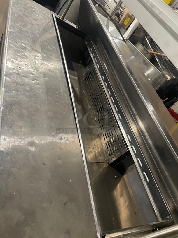 Nice! Turbo Air Stainless Steel Commercial Sandwich/Salad Refrigerated Prep Table! Eletric Powered! On Casters! With Double Over Head Shelf! MODEL TST-60SD 115V
 - Image 8 of 10