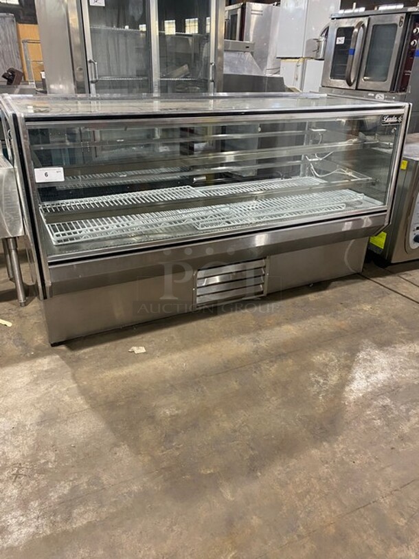 COOL! Leader Commercial Refrigerated Bakery Display Case Merchandiser! With Straight Front Glass! With Sliding Rear Access Doors! With Poly Coated Racks! Stainless Steel Body! Model: CBK77 SN: PZ03M1003 115V 60HZ 1 Phase