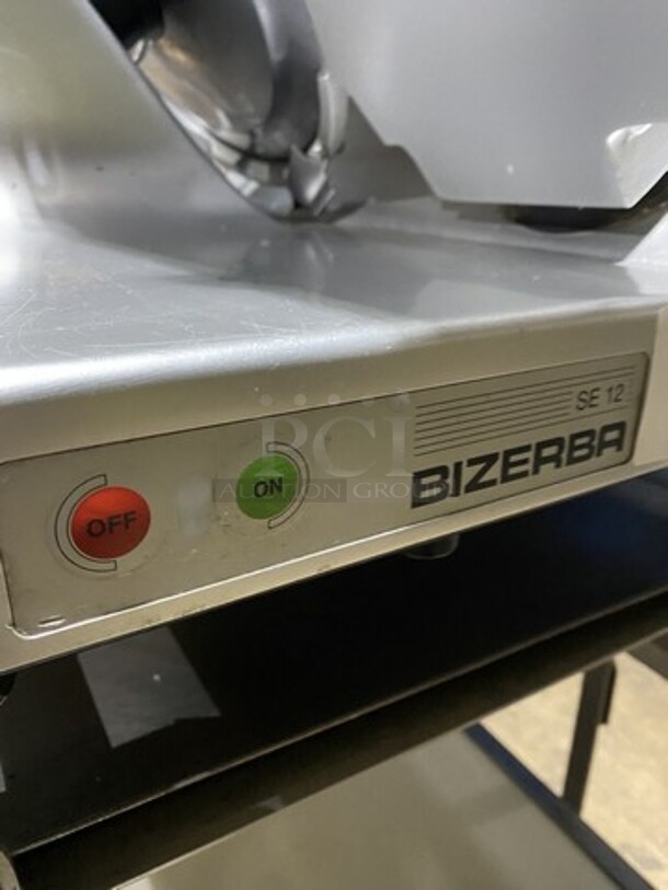 2010 Bizerba SE12 Deli Meat Slicer! On Bizerba Slicer Stand/Cart! Model SE12 Serial 30001590! 120V 1 Phase! Stand Has Casters!  - Image 7 of 11