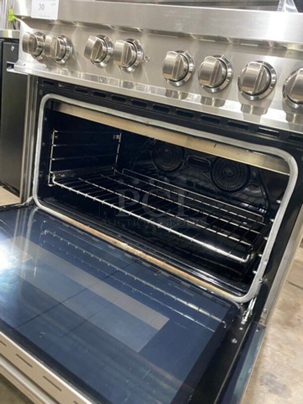 LATE MODEL! 2020 Zline Gas Powered 6 Burner Stove! With Oven Underneath! Stainless Steel! On Legs! Model: RG36 SN: 20072290130 - Image 6 of 10