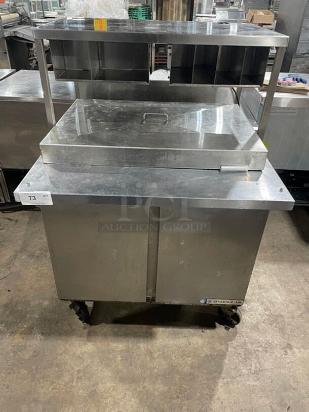 Beverage Air Stainless Steel Salad/Pizza Prep Table! With Over Head Shelf Build In Cubbies For Utensils! With 2 Door Underneath Storage Space!  On Casters! MODEL SPE36HC-15M SN: 12204295 115V 1PH - Item #1115610