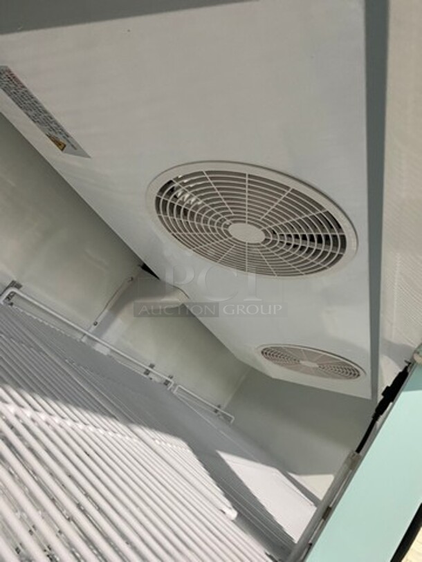 COOL! Universal Coolers Commercial 3 Door Reach In Cooler Merchandiser! With View Through Doors! With Poly Racks! On Casters! - Image 7 of 8