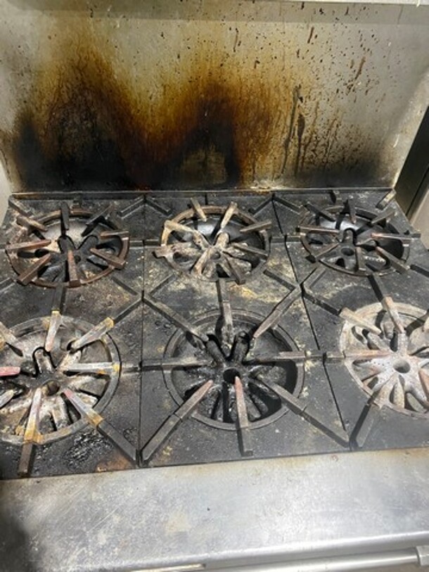 Garland Commercial Natural Gas Powered 6 Burner Stove! With Raised Backsplash & Overhead Salamander Shelf! With Convection Oven Underneath! All Stainless Steel! Model H286RC Serial 0303RG0779! On Casters! WORKING WHEN REMOVED! - Image 5 of 12