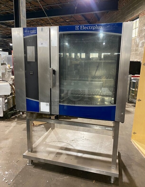 WOW! Electrolux Air-O-Steam Natural Gas Touch Line Combi Convection Oven! With View Through Door! Metal Oven Racks! With Open Underneath Storage Space! All Stainless Steel! On Legs! Model: AOS102GTP1 SN: 20404001 - Item #1109134