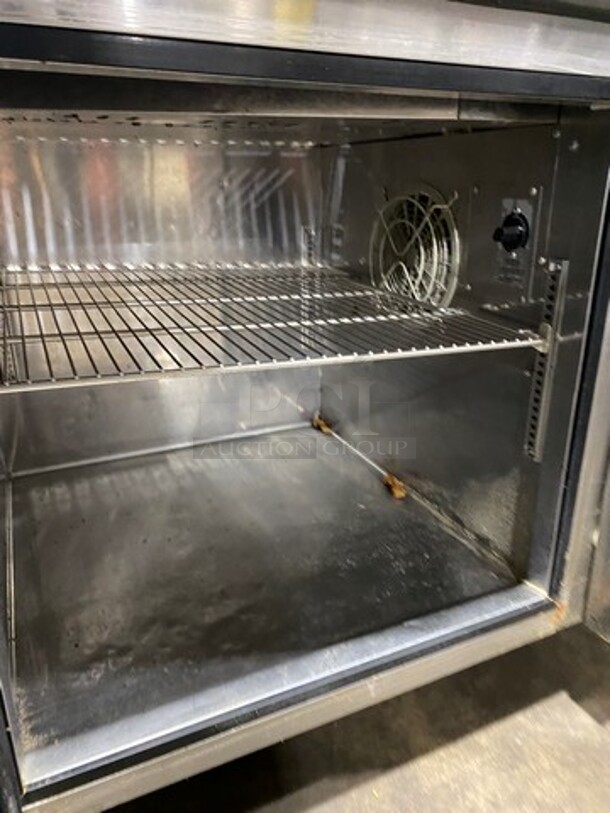 Nice! Turbo Air Commercial Refrigerated Pizza Prep Table! With Commercial Cutting Board! With Single Door Storage Space! Poly Coated Rack! All Stainless Steel! On Casters! Model: TPR44SD SN: TP4RA0100B 115V 60HZ 1 Phase! Working When Removed!  - Image 6 of 10