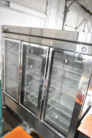 True T-72G Stainless Steel Commercial 3 Door Reach In Cooler Merchandiser w/ Poly Coated Racks on Commercial Casters. 115 Volts, 1 Phase. Tested and Working!