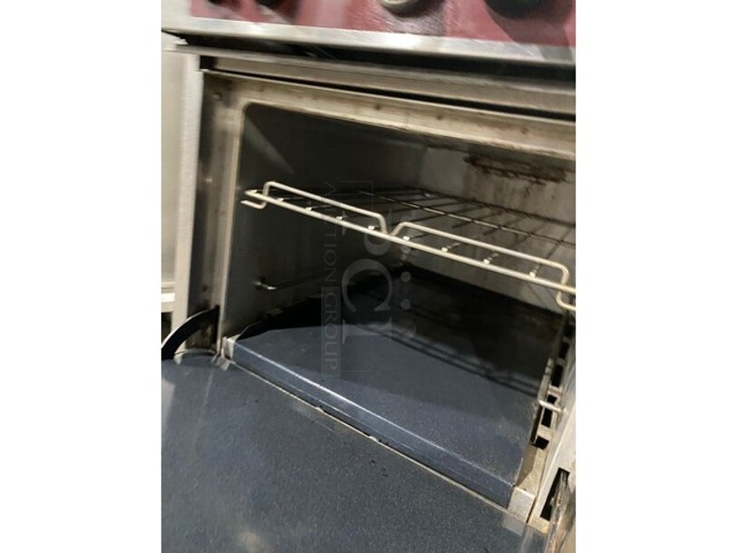 Nice! Extra Clean! Southbend All Stainless SteelNatural Gas Powered 4 Burner Oven/Range With Raised BackSplash! With Oven Underneath! On Caster Wheels! Working When Removed!  - Image 7 of 9