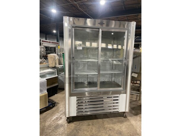 Universal Coolers Commercial 2 Door Refrigerator Merchandiser! With Sliding View Through Doors! With Poly Coated Racks! On Casters! - Image 1 of 7