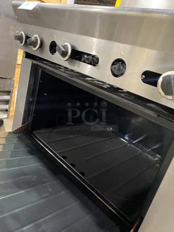 US Range Commercial Natural Gas Powered 4 Burner Stove With Built In Flat Grill! Flat Grill Has Side Splashes! With Raised Back Splash And Salamander Shelf! With Oven Underneath! All Stainless Steel! On Legs! - Image 8 of 10