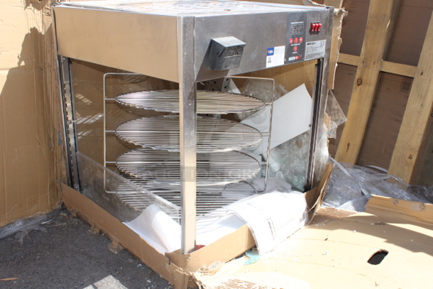 BRAND NEW SCRATCH & DENT! ServIt PDW18D1 18" Full-Service Pizza Warmer with 4-Shelf Rotating Rack 23-1/2x25-1/4x27-1/2. S/N: 1441411300231 Unit is dented and glass is broken.  - Image 4 of 5